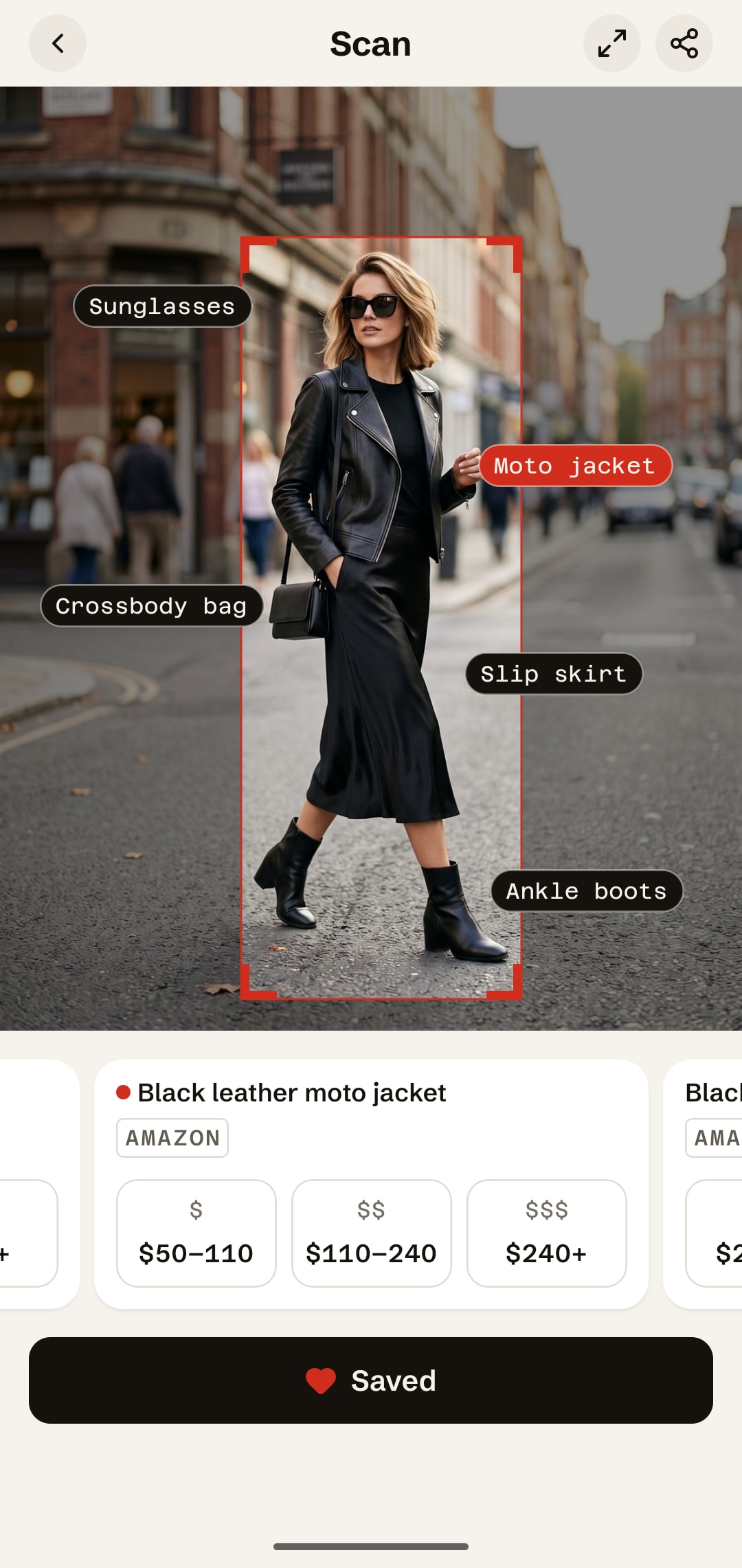 IDtheLook scan of a woman in a black leather jacket, with sunglasses, moto jacket, slip skirt, crossbody bag and ankle boots each tagged on the photo, and a $10 to $25, $25 to $75, $75 and up price ladder below